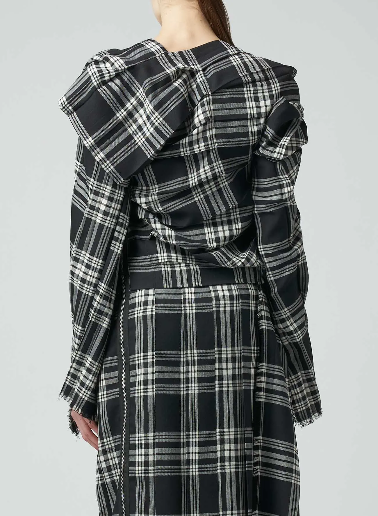 PLAID DRESS WITH TWISTED PLEATS